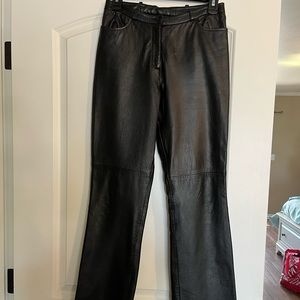 BCBG genuine 100% leather boot cut pants. Size 0. Gently worn!